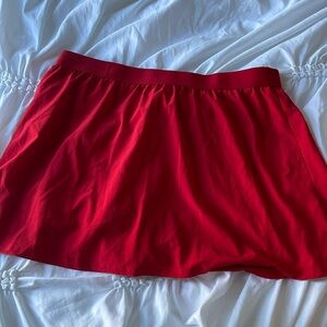 Red sport skirt with shorts and pockets